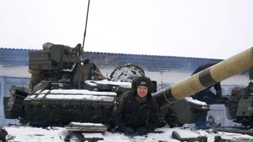 A Ukrainian Army tank operator in Kharkiv prepares for the Russian invasion.